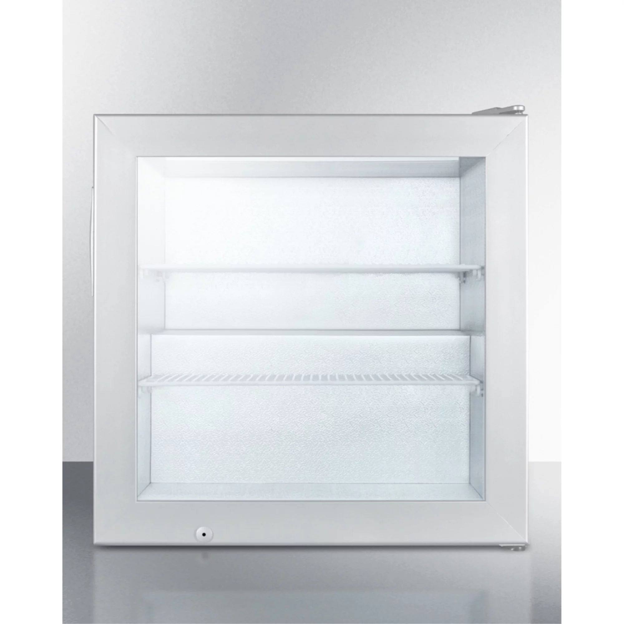 Countertop commercial freezer with self-closing door and stainless steel wrapped cabinet